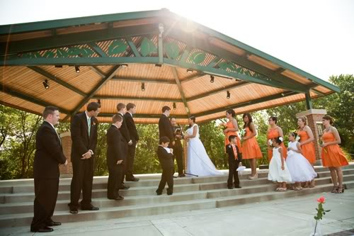 Wedding party on steps of Pavilion in Colby Park